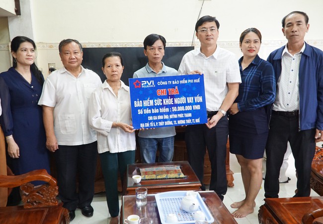 Hội Nông dân Việt Nam phối hợp Bảo hiểm PVI chi trả bồi thường bảo hiểm sức khỏe cho người vay vốn - Ảnh 3.