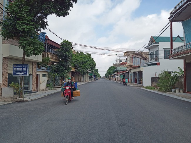 Thực hiện tốt tiêu chí môi trường ở xã nông thôn mới nâng cao: Sống an vui ở làng quê xanh - sạch - đẹp - Ảnh 1.