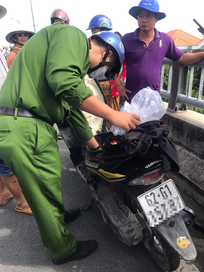 Tin báo có người nhảy sông tự tử là chưa chính xác ở Long An - Ảnh 1.