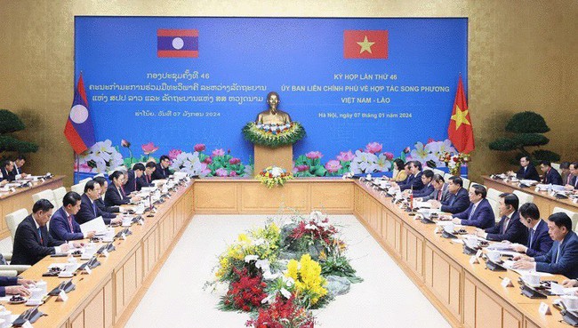 Thủ tướng Việt Nam và Lào đồng chủ trì Kỳ họp Ủy ban liên Chính phủ hai nước- Ảnh 1.