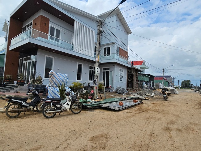 Người dân Bình Định đón Tết trong nhà mới ở khu tái định cư cao tốc Bắc - Nam- Ảnh 1.