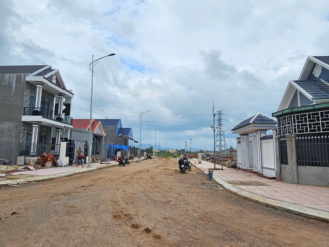 Người dân Bình Định đón Tết trong nhà mới ở khu tái định cư cao tốc Bắc - Nam- Ảnh 4.