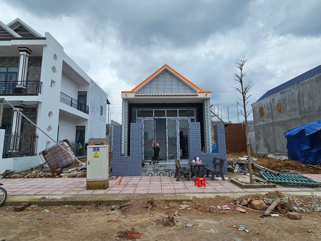 Người dân Bình Định đón Tết trong nhà mới ở khu tái định cư cao tốc Bắc - Nam- Ảnh 3.