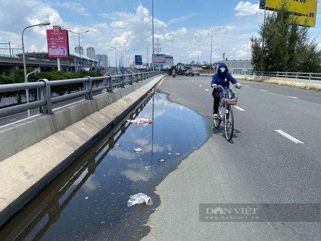 TP.HCM: Cầu vượt Nguyễn Hữu Cảnh lại bị võng, đọng nước sau hơn 1 năm khắc phục- Ảnh 3.