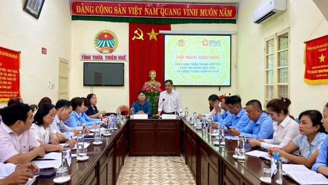 Hội Nông dân tỉnh Thừa Thiên Huế và Bảo hiểm PVI Huế tổ chức hội nghị đánh giá kết quả hợp tác- Ảnh 1.