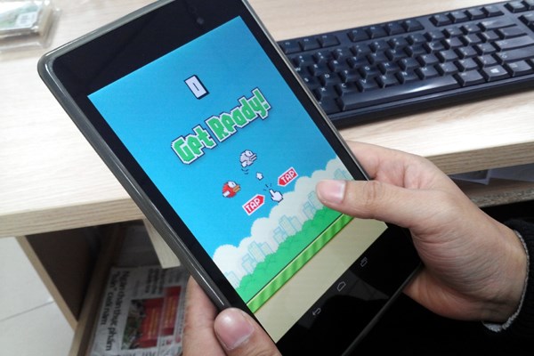 Tác giả Flappy Bird đã bị nghi ngờ nhiều khi đưa ra lý do gỡ bỏ 'con đẻ' của mình. (Ảnh: N.K/Vietnam+)