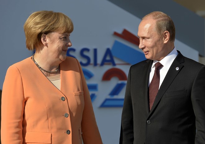 Tổng thống Nga Putin và Thủ tướng Đức Merkel tại Hội nghị thượng đỉnh G20 ở Saint Petersburg ngày 5.9.2013. (Ảnh: AFP)