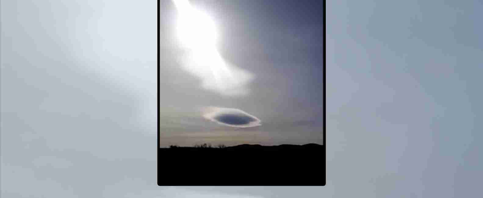 Người ngoài hành tinh giấu UFO sau đám mây nhưng bị mặt trời làm lộ