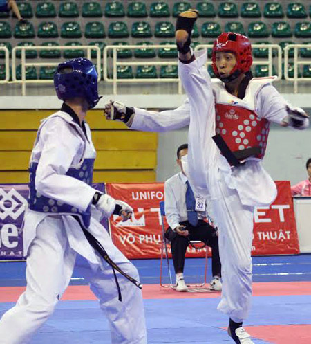 Võ sĩ taekwondo Lê Huỳnh Châu (phải) từng giành HCĐ  Giải vô địch thế giới. 