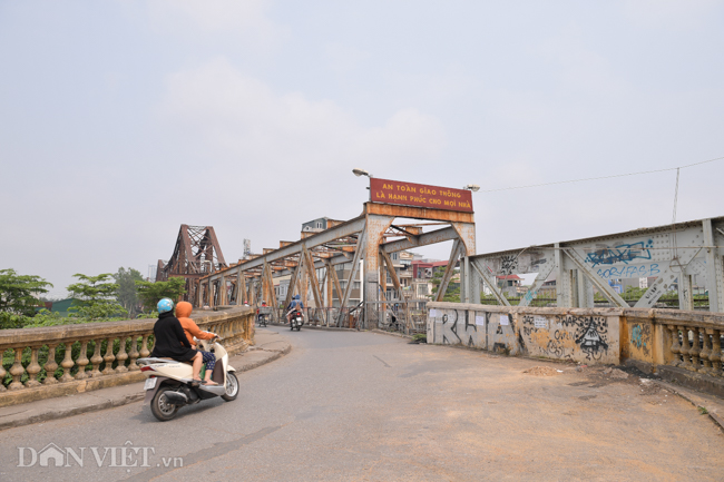 anh: hai hung kim tiem dinh mau vut la liet tren cau long bien hinh anh 1