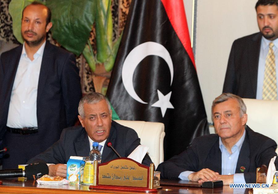 Thủ tướng Ali Zeidan (bên trái) và Chủ tịch Quốc hội Nouri Abusahmain (bên phải)
