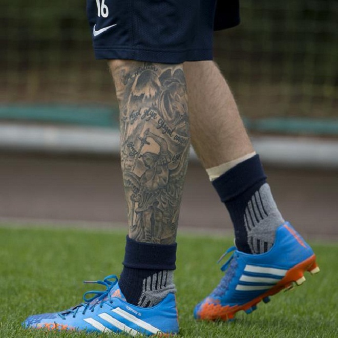 Cheeky Celtic fan gets Aaron Ramsey commemorative Seville Rangers tattoo  on his bum  The Sun