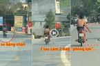 Clip: Nam thanh niên 2 tay cầm  2 dao “phóng lợn”, lái xe máy bằng chân chạy dọc đường quốc lộ