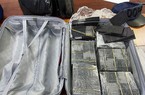 Hai hành khách mang 1 triệu USD nhuộm đen ở sân bay Tân Sơn Nhất bị tạm giữ