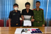 Nghệ An: Mang theo súng đã lên nòng khi giao 2.600 viên ma túy