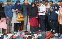 Nóng: Nạn nhân đầu tiên vụ rơi máy bay Indonesia được nhận dạng