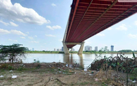 Vụ chồng bỏ xe trên cầu Thăng Long: Cảnh sát điều tra nguyên nhân tử vong