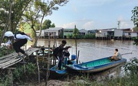 Bỏ việc, đùm cơm đi học cùng con: Chuyện không lạ ở Đất Mũi