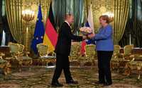 Điện Kremlin đáp trả cáo buộc của bà Merkel nói ông Putin đến muộn vì bia