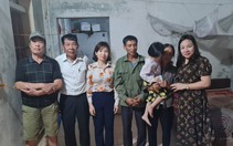 Gia đình cháu Thảo xúc động nhận tiền tài trợ từ Báo NTNN/ Dân Việt