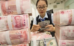 Trung Quốc ngỏ ý bình ổn tiền tệ, Dow Jones leo dốc 311 điểm