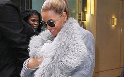 Né paparazzi, Beyonce bọc con kín mít