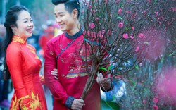 Nguyên Khang diện áo dài gấm, dạo phố hoa Tết ở Hà Nội