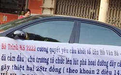 Bà chủ khách sạn căng băng-rôn diễu phố "bêu xấu" cán bộ