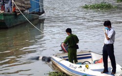 Thi thể người phụ nữ mắc cành tre nổi trên sông Hồng