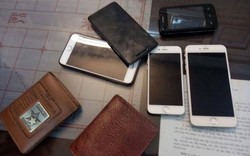 Cặp vợ chồng "đạo chích" bị bắt với 15 chiếc điện thoại trong người