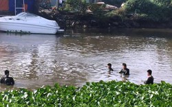 Cả chục người nhái lặn tìm dưới sông vì chiếc xe máy trên bờ