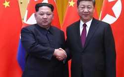 Ông Kim Jong-un chính thức gặp gỡ ông Tập Cận Bình