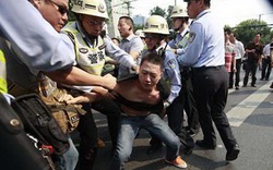 Biểu tình ở Trung Quốc, xô xát bùng phát, 39 người bị thương