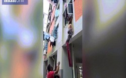 Singapore: Ăn ở tầng 2, nhoài người túm tóc người phụ nữ rơi từ tầng 3