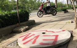 Muôn kiểu khắc phục tạm hố ga mất nắp trên đại lộ đẹp nhất Sài Gòn