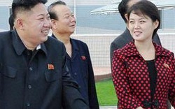 Kim Jong-un vui vẻ bên vợ xinh đẹp ở công viên
