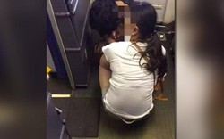 Trung Quốc: Mẹ cho con… đại tiện giữa lối đi máy bay