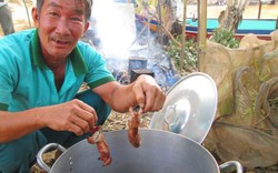 "Độc chiêu" món chuột nướng lon tại ruộng miền Tây