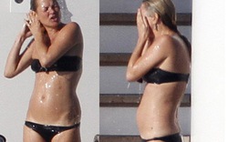 Siêu mẫu Kate Moss mặc bikini bé xíu, lộ eo "bánh mì"