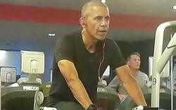 Ảnh "chộp" Obama đeo tai nghe hồng tập gym ở Ba Lan