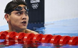 Thần đồng bơi lội Singapore liên tiếp đánh bại Michael Phelps