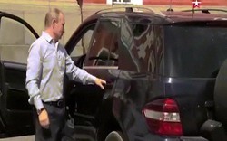 Video: Người áo đỏ bí ẩn được Putin lái xe "phục vụ"