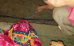 Bé trai 4 tuổi tử vong trên đường làng, dây điện dính vào chân