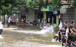 Chuyện lạ: Chèo thuyền, lướt sóng giữa đường phố Hải Phòng