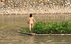 Chuyện khó tin: Cô gái trẻ cởi đồ bơi ra giữa sông Tô Lịch nhảy múa