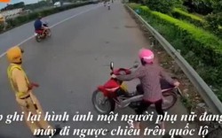 Dắt xe đi ngược chiều 'né' công an, người phụ nữ vẫn gặp 'kết đắng'