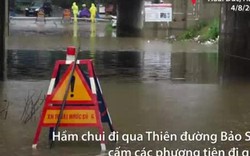 Hầm chui đại lộ Thăng Long chặn cửa, cấm xe vì ngập sâu