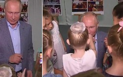 Hành động quỳ gối bất ngờ của Putin khiến người hâm mộ tan chảy