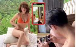 Ngọc Trinh "gây sốt" với clip vô tư chỉnh bikini trước mặt trai Tây cởi trần chụp ảnh