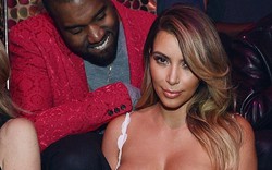 Kanye West chăm chú &#34;nhòm ngực&#34; bạn gái 
